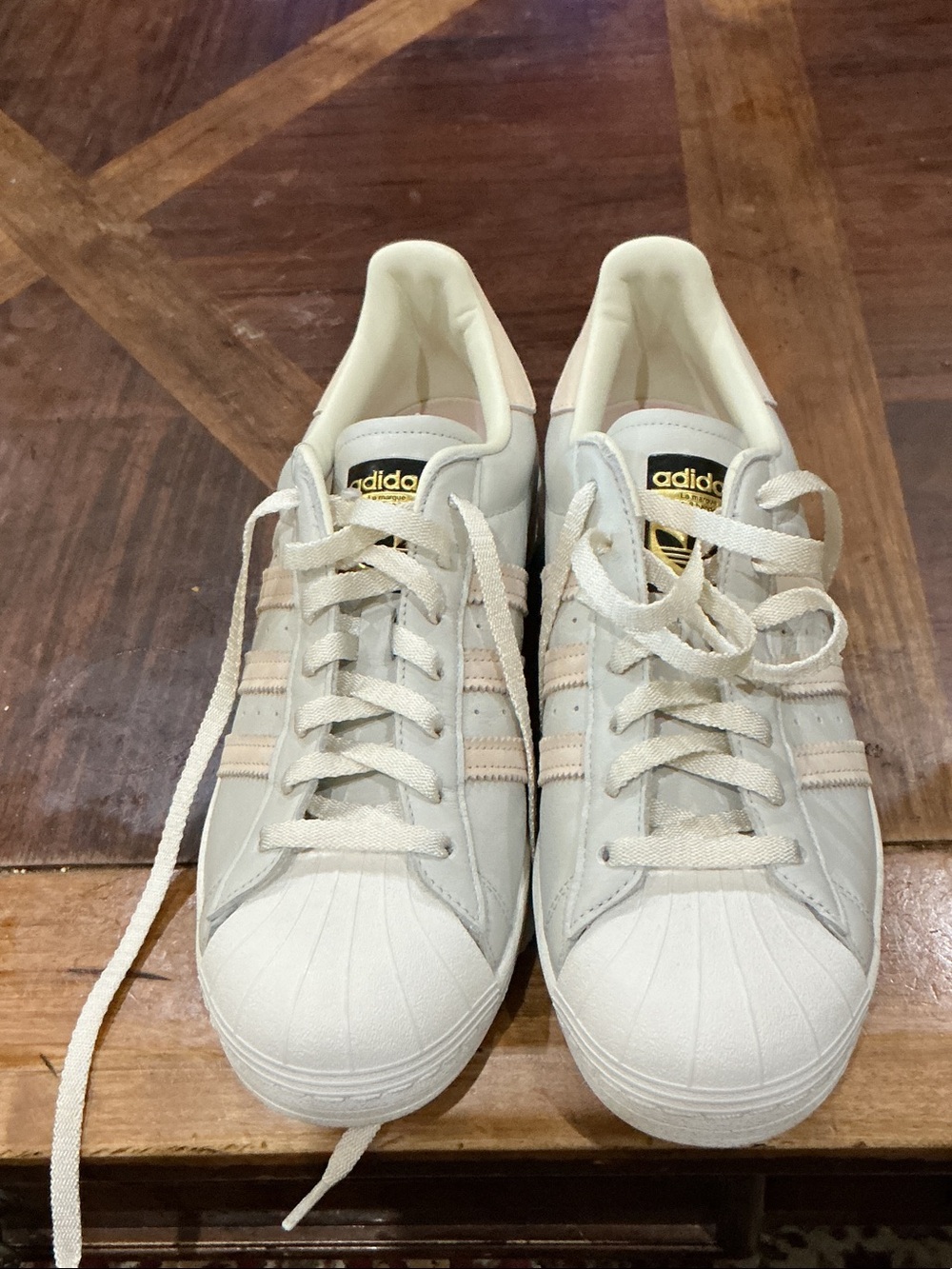 adidas White Superstar Sneakers with Pale Pink Stripes